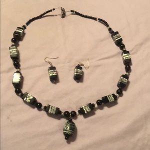 Handmade jewelry earrings and necklace .